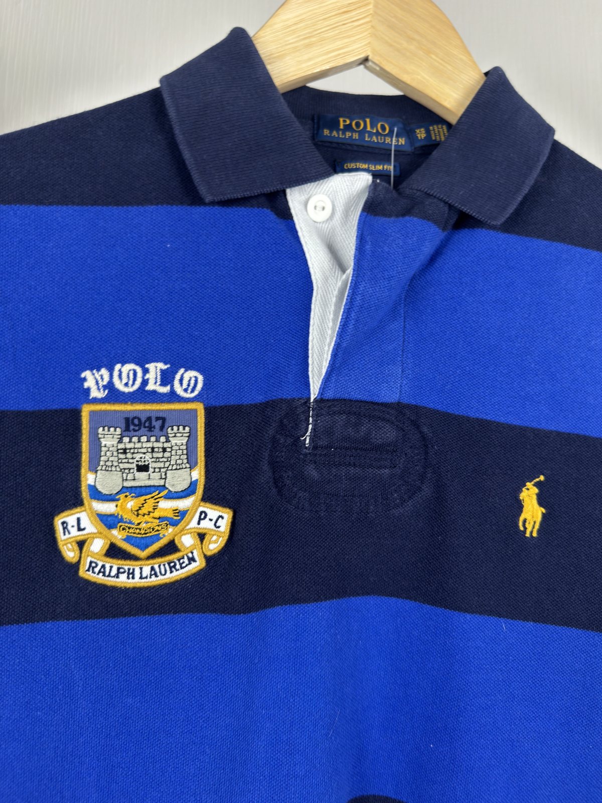 Polo Ralph Lauren rayé bleu écusson