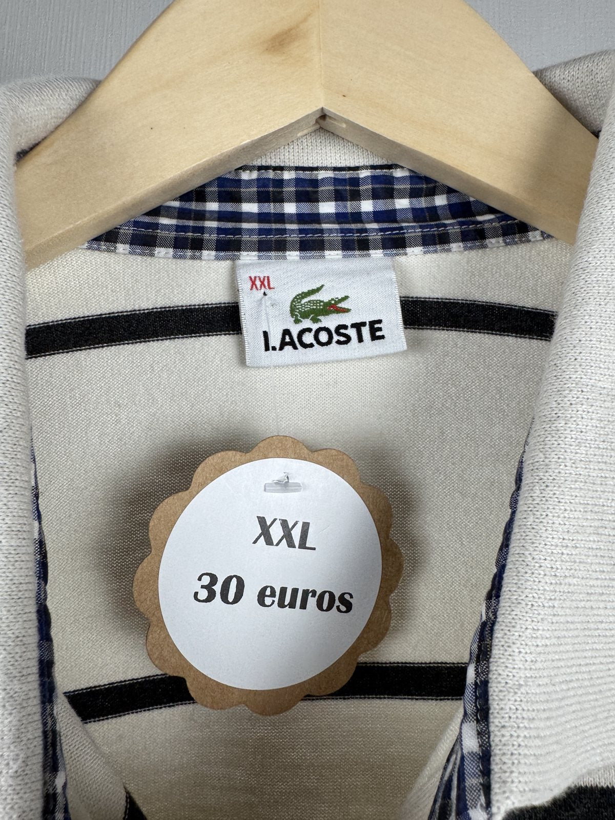 Polo manches longues Lacoste rayé écru et marine