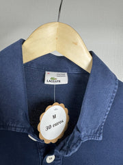Polo manches longues Lacoste bleu délavé